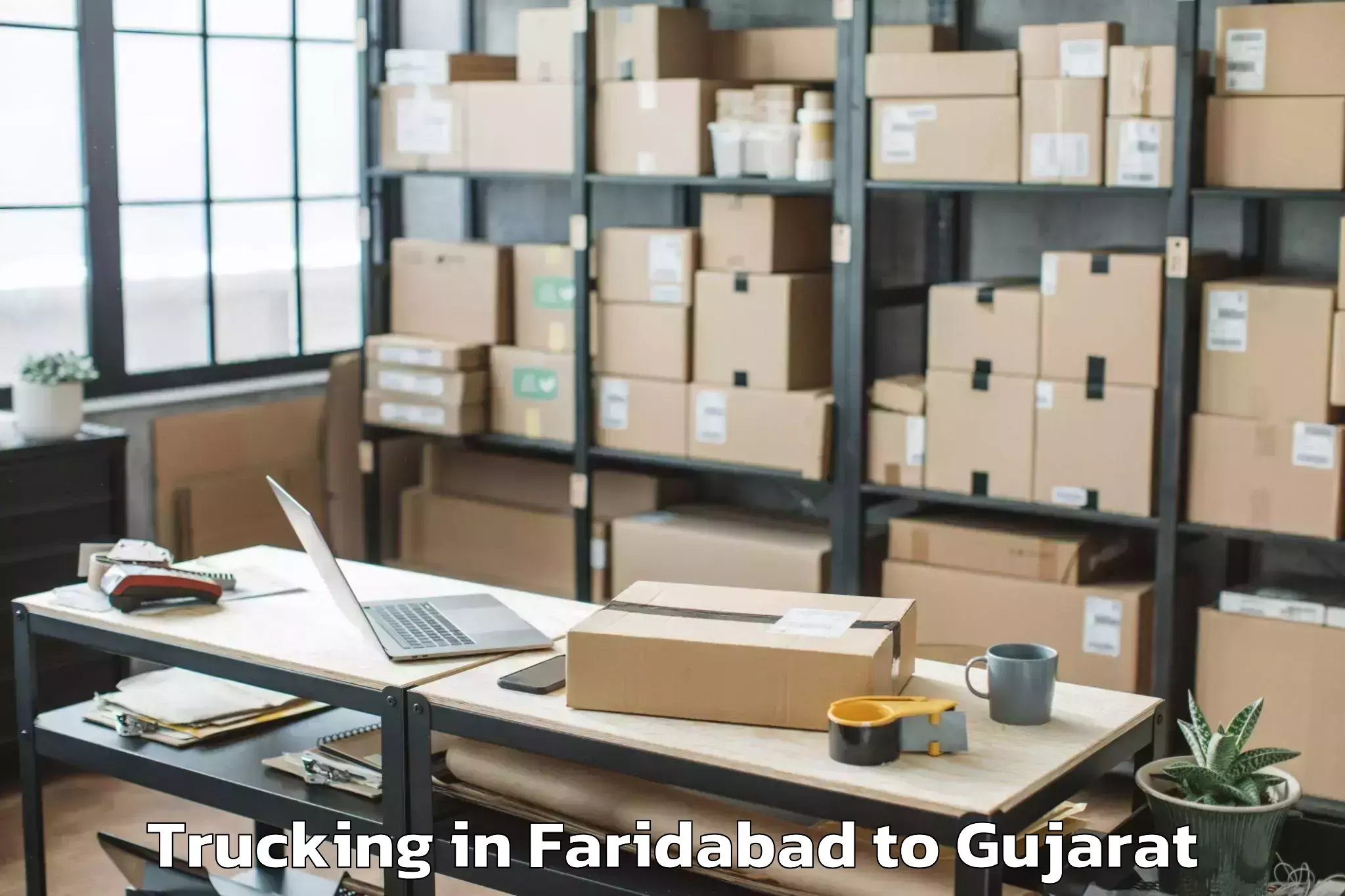 Top Faridabad to Gujarat University Of Transpla Trucking Available